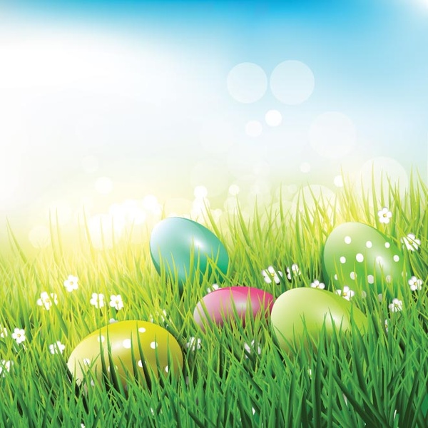 uovo di Pasqua variopinto di vettore libero in erba
