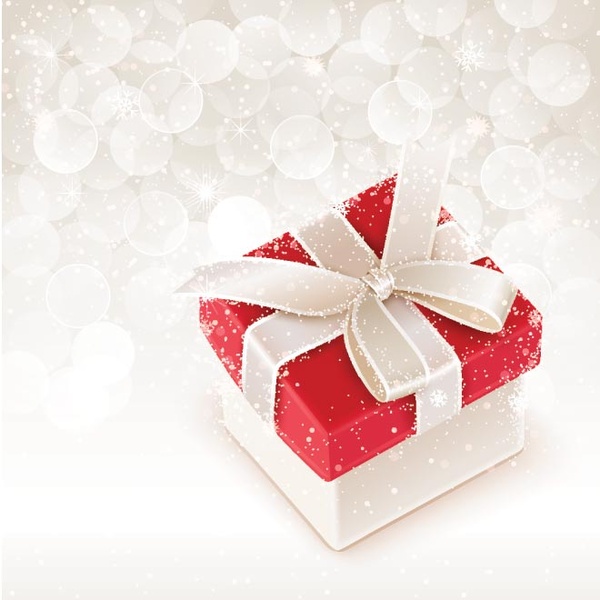 vektor gratis Selamat Natal gift box elegan di latar belakang