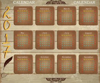 木製の背景を持つカレンダー 2017 のデザイン