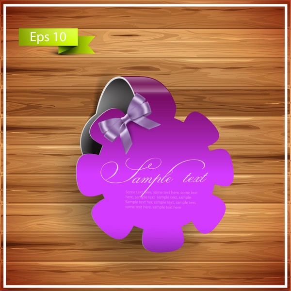 insignia de cinta flor violeta sobre fondo de madera