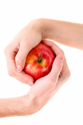 蘋果和 hq 圖片的手
