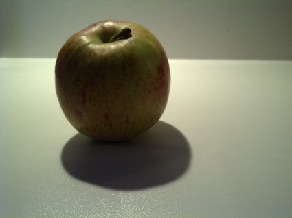 manzana con sombra