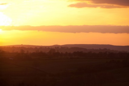 sunset Inggris