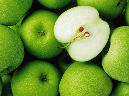 Grüner Apfel Hintergrund hat Foto