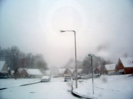 Neighborhood Street Covered In Snow
