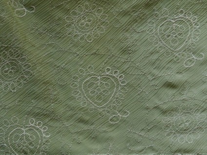 tessuto verde oliva con design