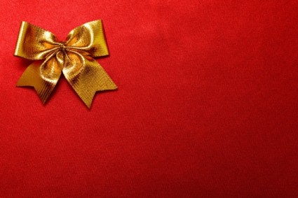 kain merah dengan emas busur dan hd gambar