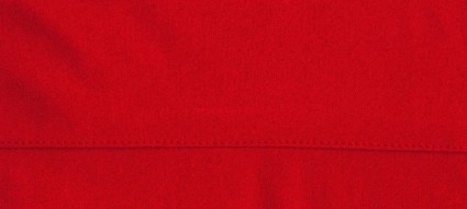 kain merah dengan jahitan