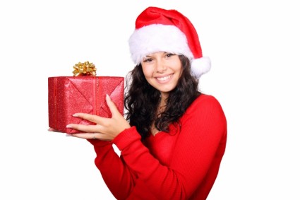 Santa holding cadeau de Noël