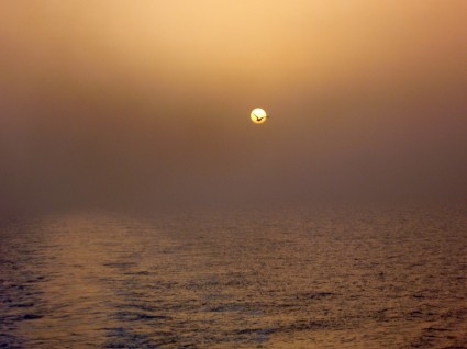 matahari terbenam laut Yunani