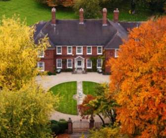 Mansion In Autumn
