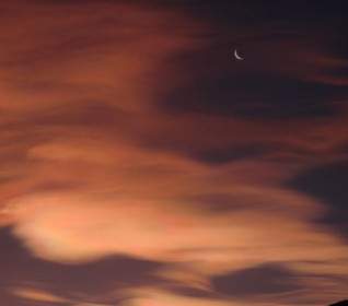 Nacreous Clouds And Moon