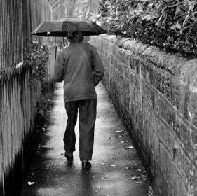 Old Man In Rain