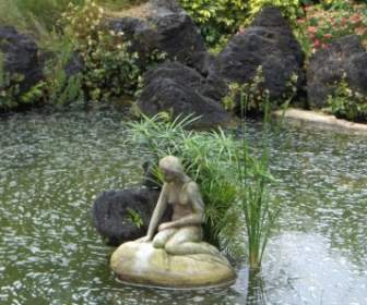 Statue In Pond