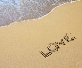 Word Love In Sand
