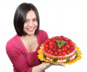 ケーキを持つ若い女